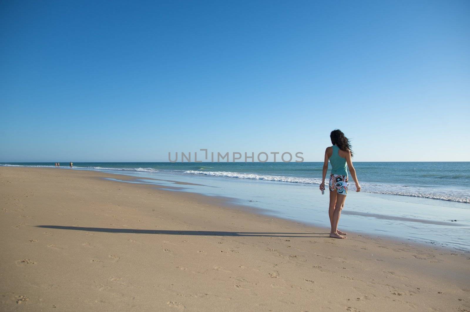 woman dressed at el palmar beach in cadiz spain