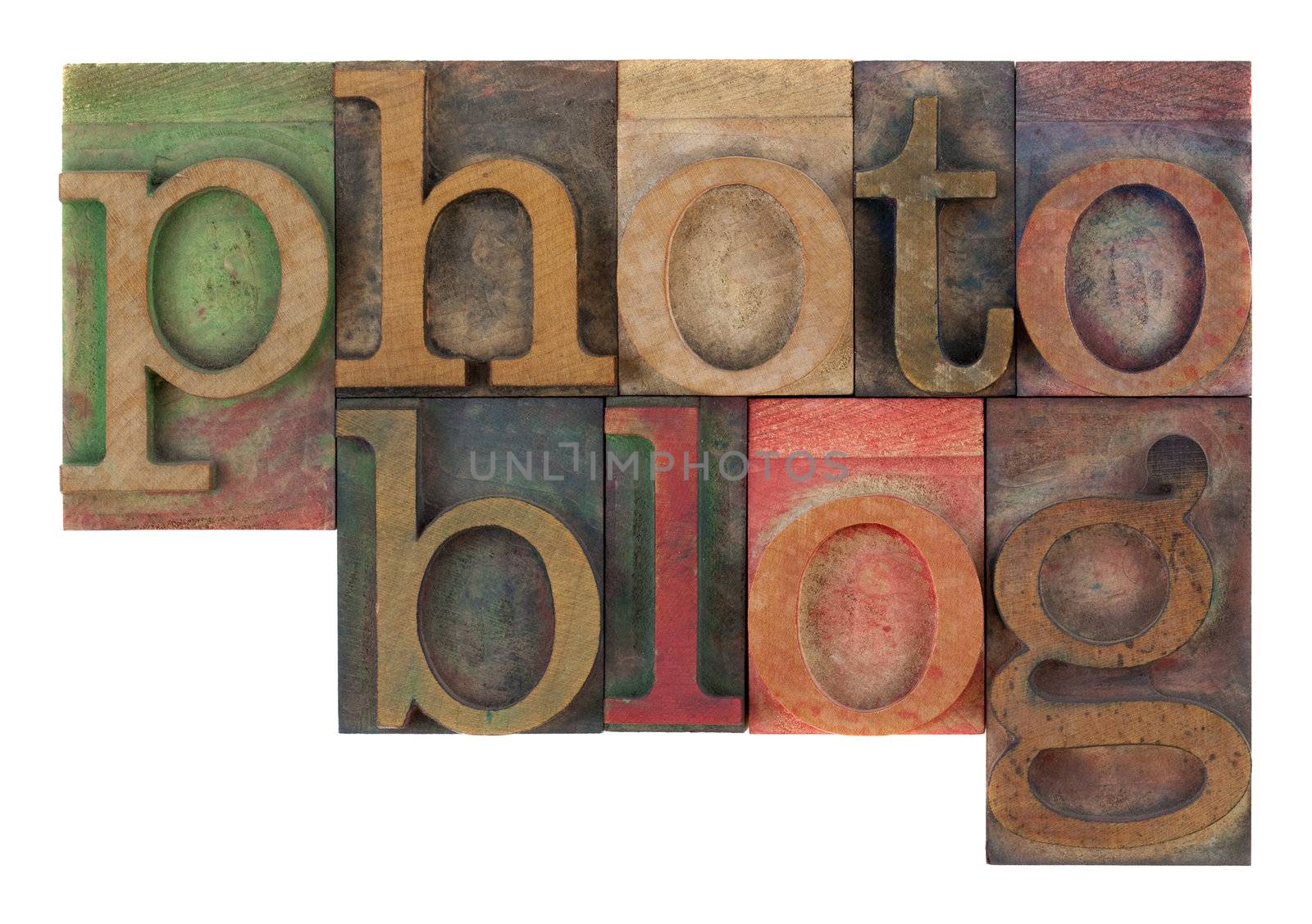 word photoblog in old letterpress wooden type blocks, stained by colorful inks,  isolated on white