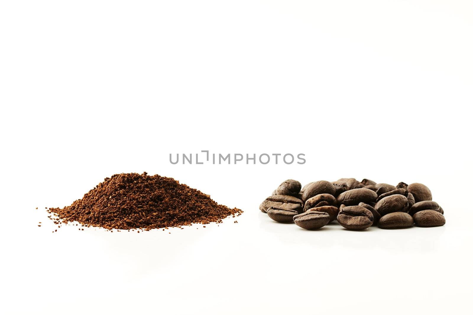 some coffee beans and coffee grain on white background