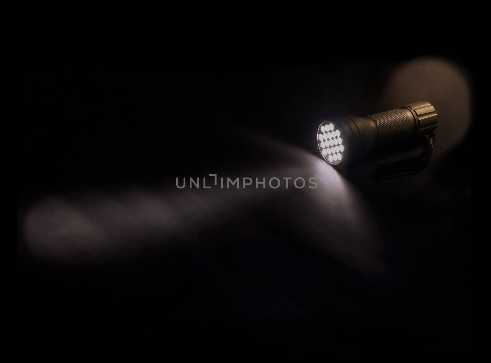 flashlight glowing on the dark