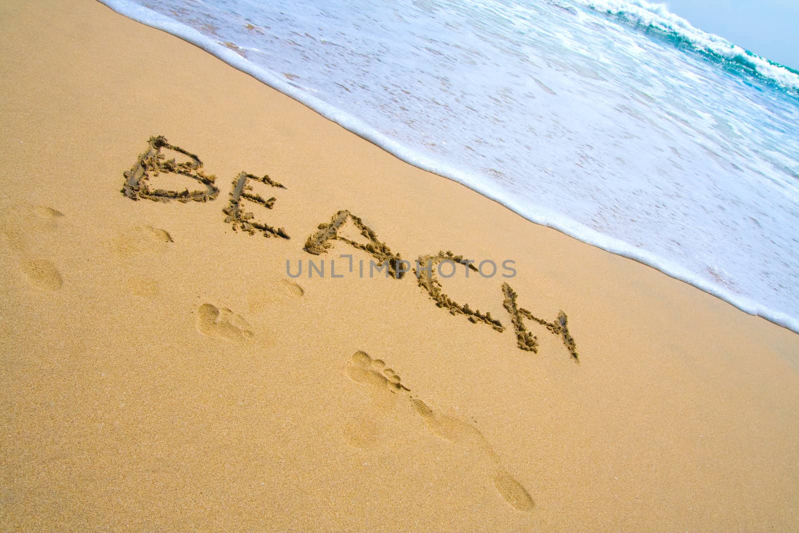 Paradise beach with blue sky and water and white sand.