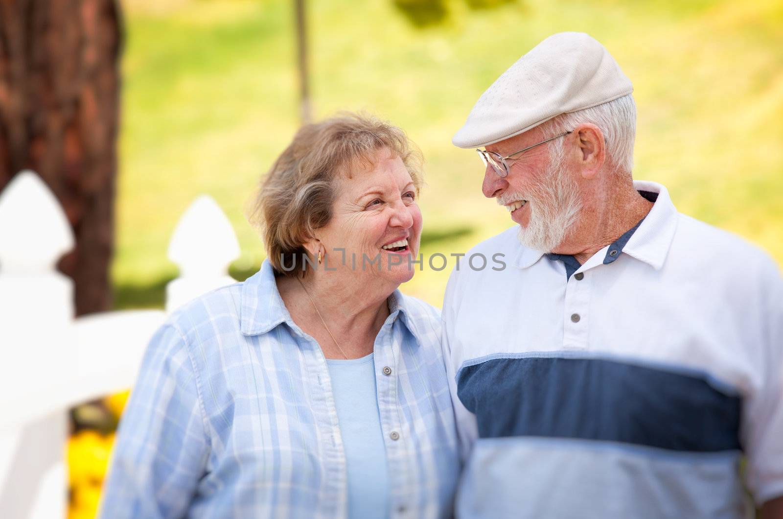 Happy Senior Couple in The Park by Feverpitched