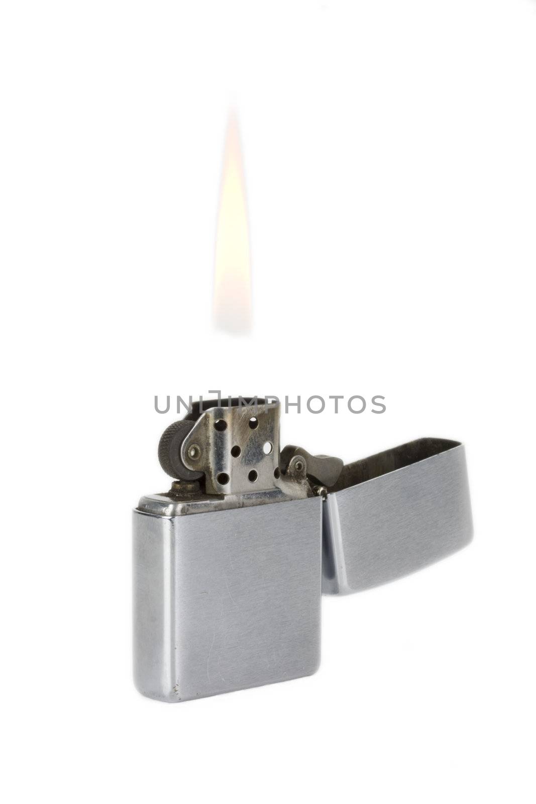 battered lighter with flame on white background