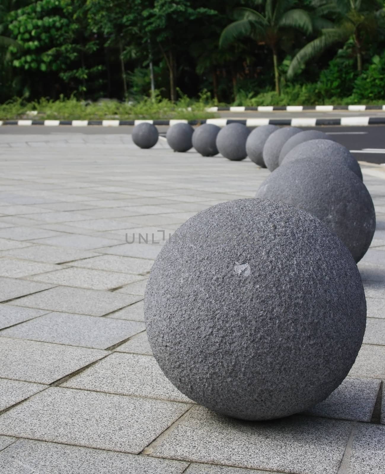 A set of round sculpture in front of Singapore botanical garden.