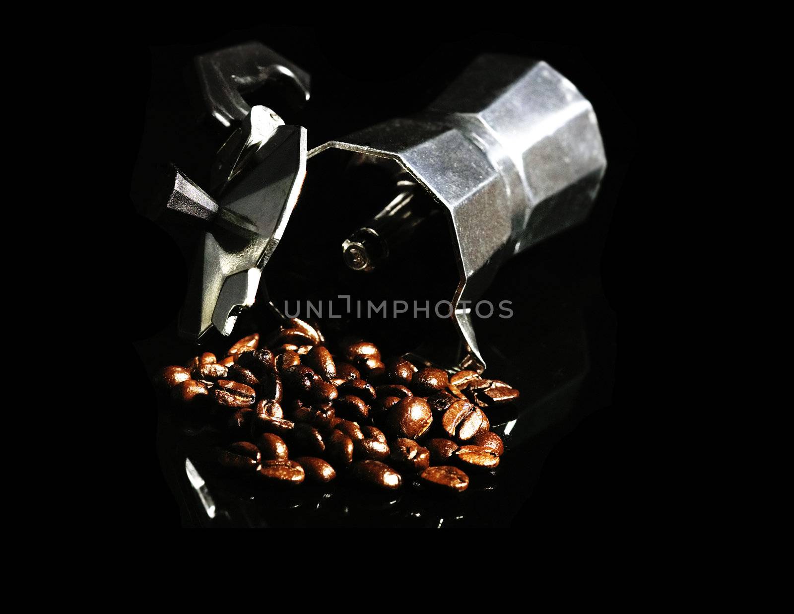 coffee beans and mocha machine on black background