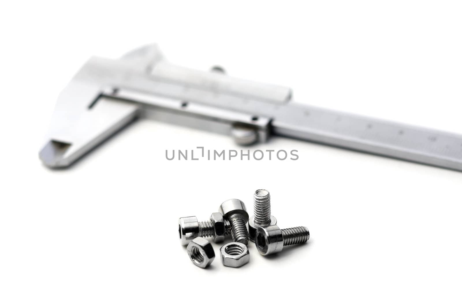 caliper and bolts on white background