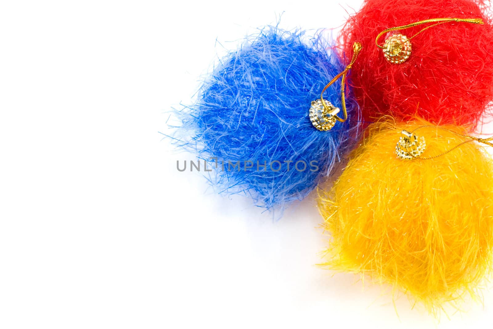 Fluffy christmas baubles on white background