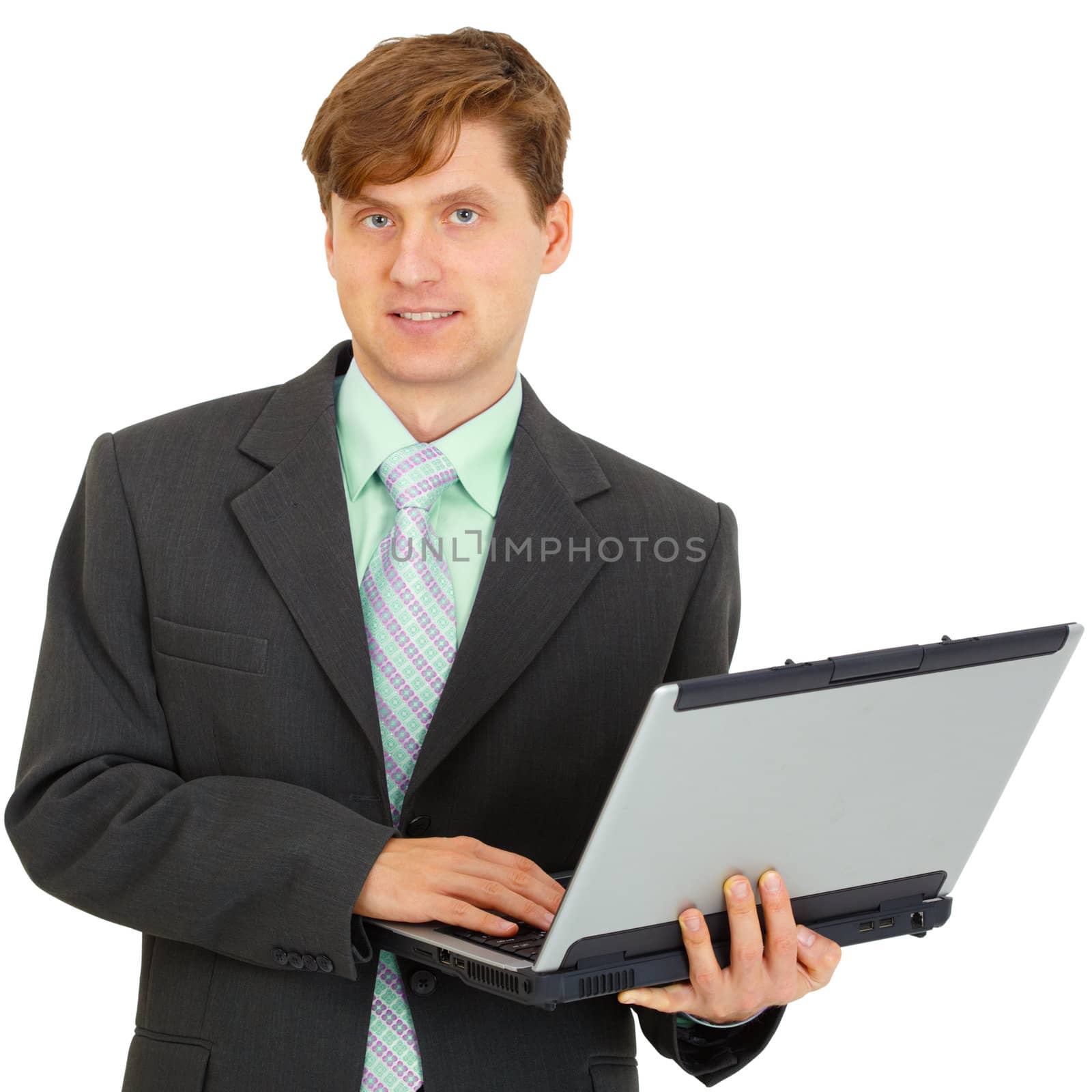 Man with laptop in hand on white background by pzaxe