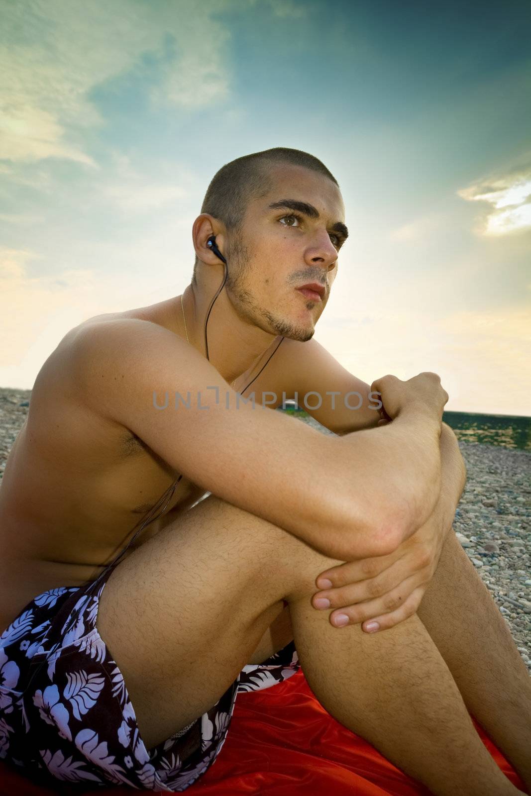 Young man at the beach.