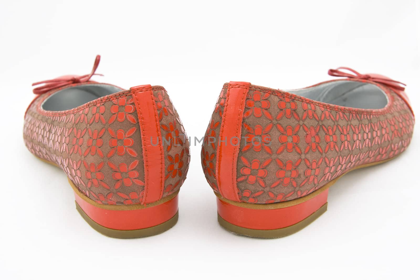 pair of red woman shoes by Yasioo
