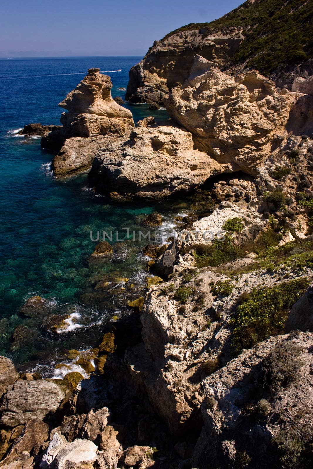 Looking out to sea from the top of a rocky cliff at Ponza island