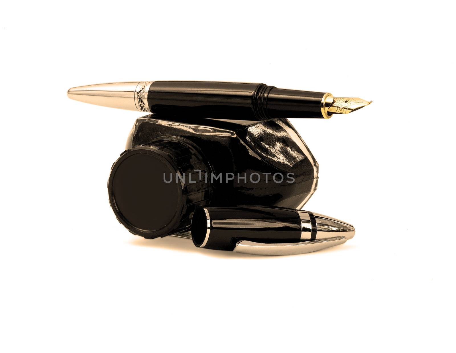 fountain pen and black ink bottle isolated on white background sepia filter