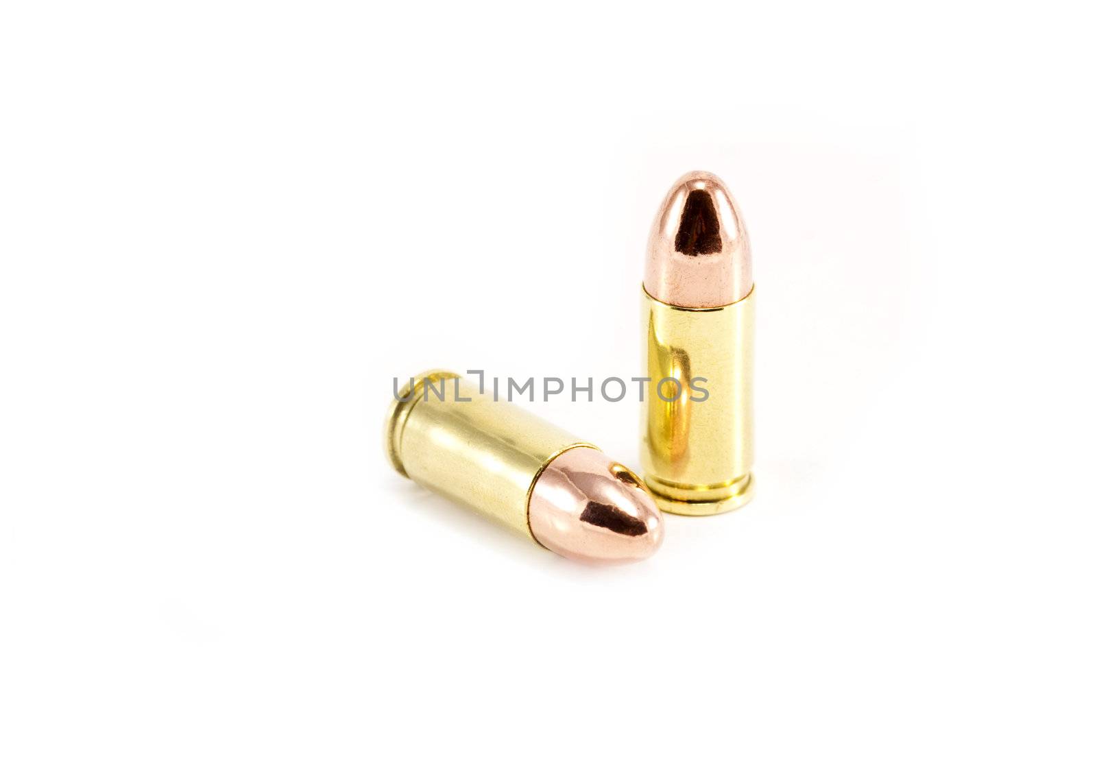 Two 9mm bullets isolated on white by ChrisAlleaume