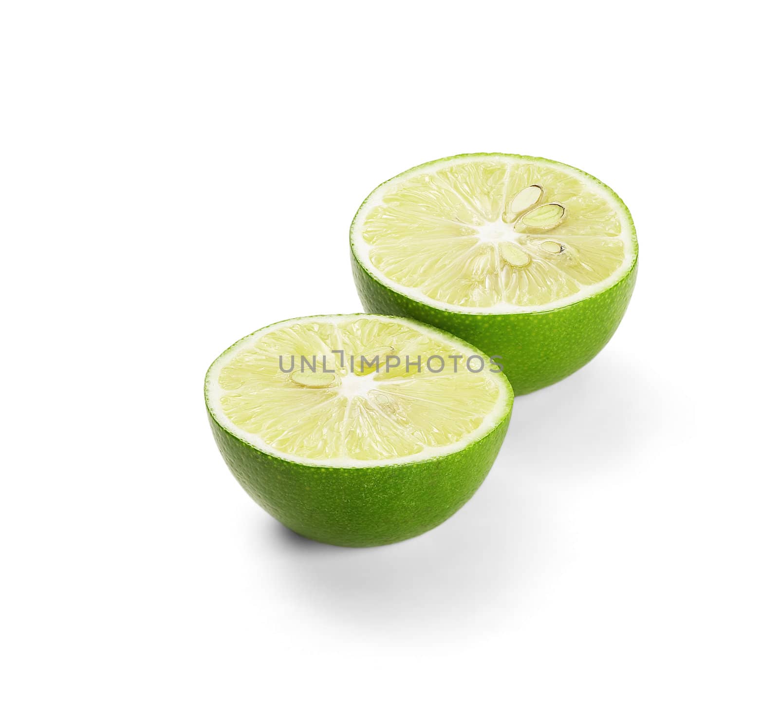 green fresh lime isolated over white background