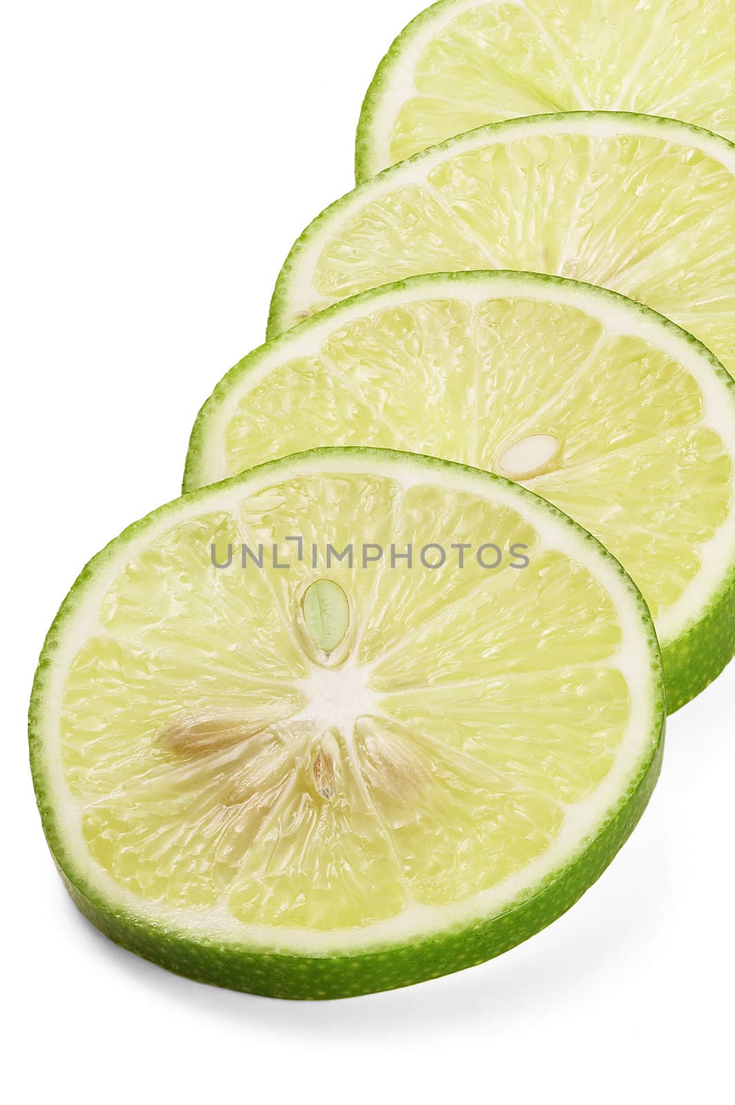 green fresh lime slices isolated over white background