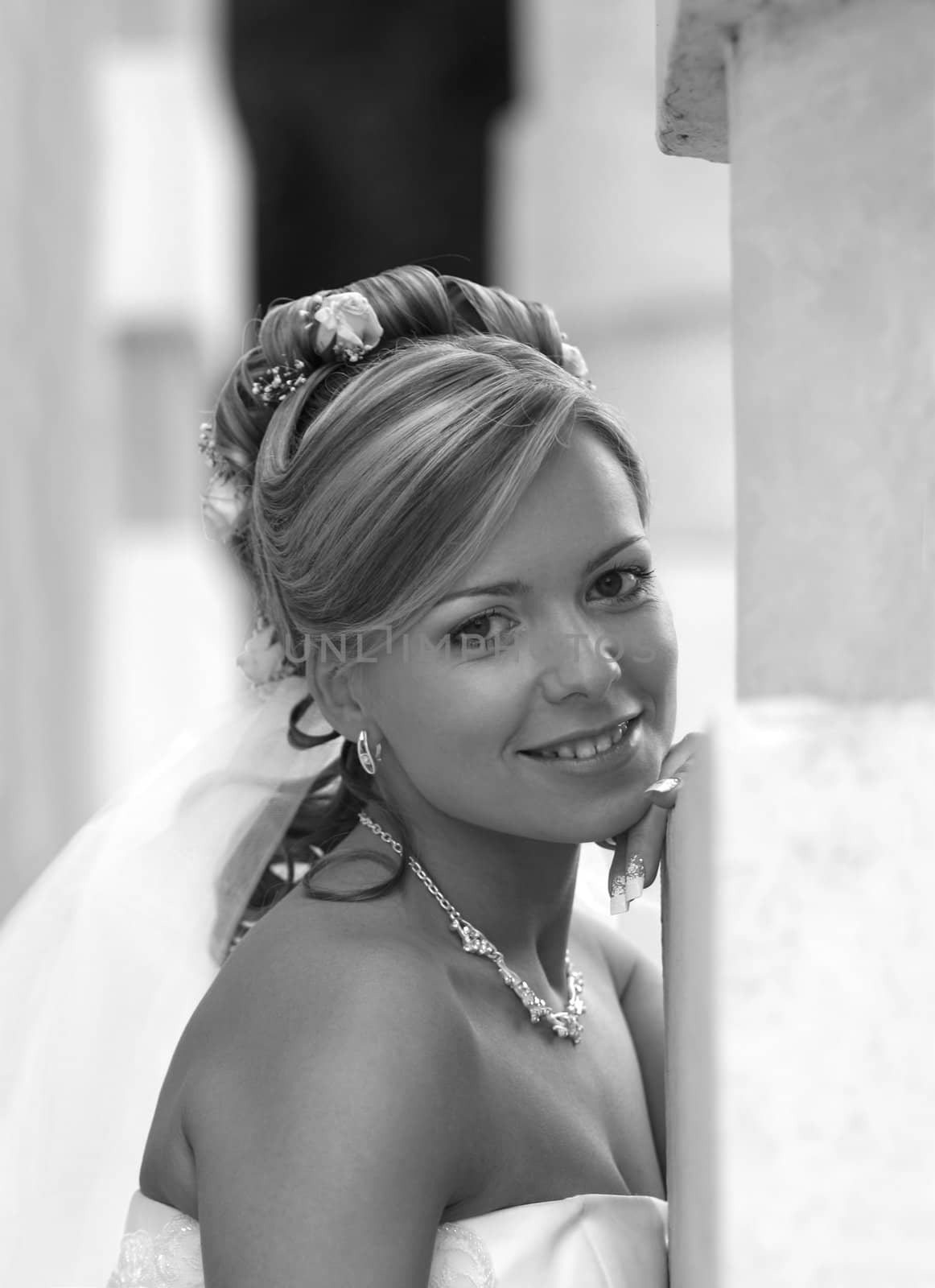 Portrait of the beautiful bride in park