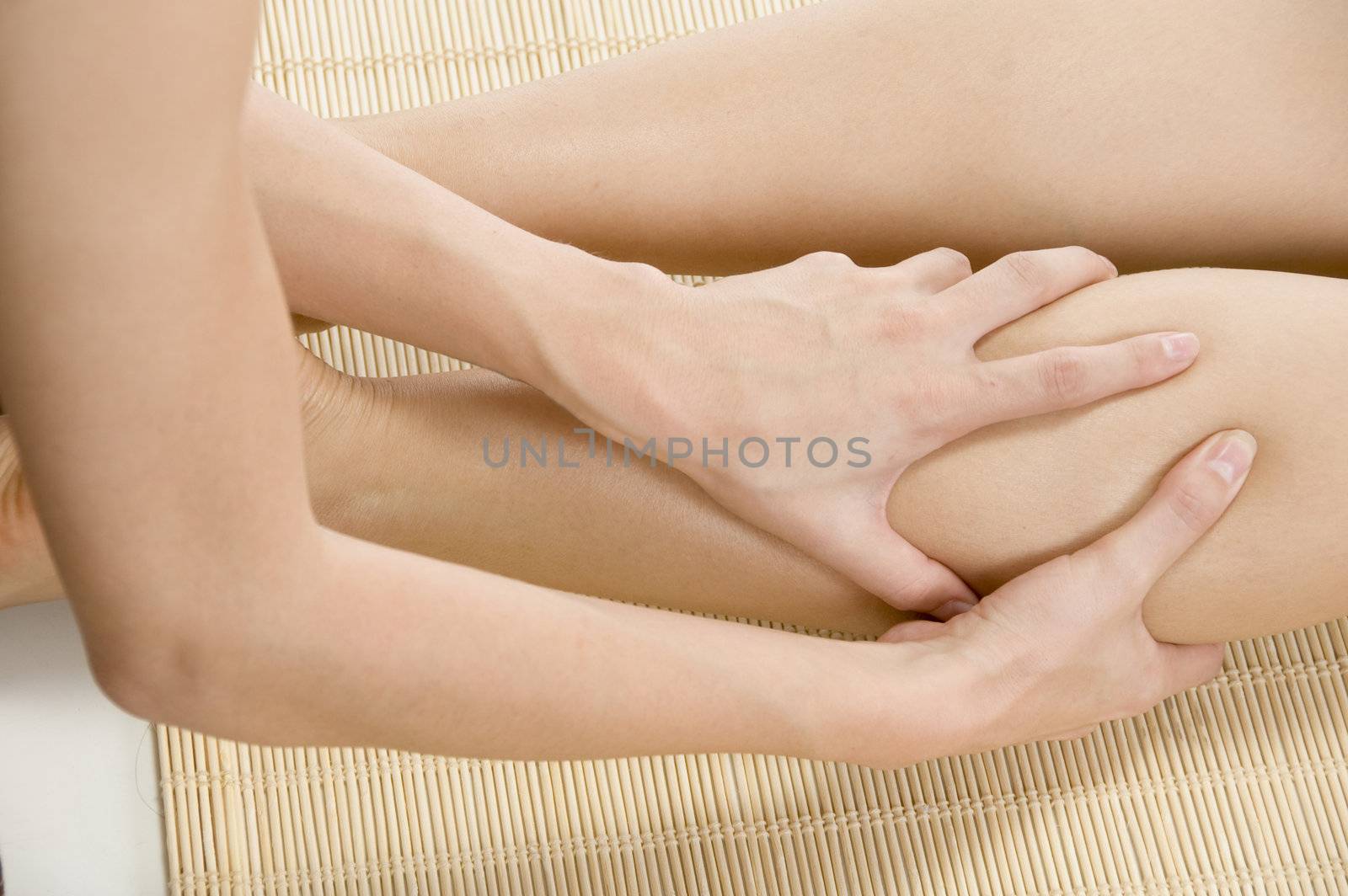 beautician doing pedicure with white background