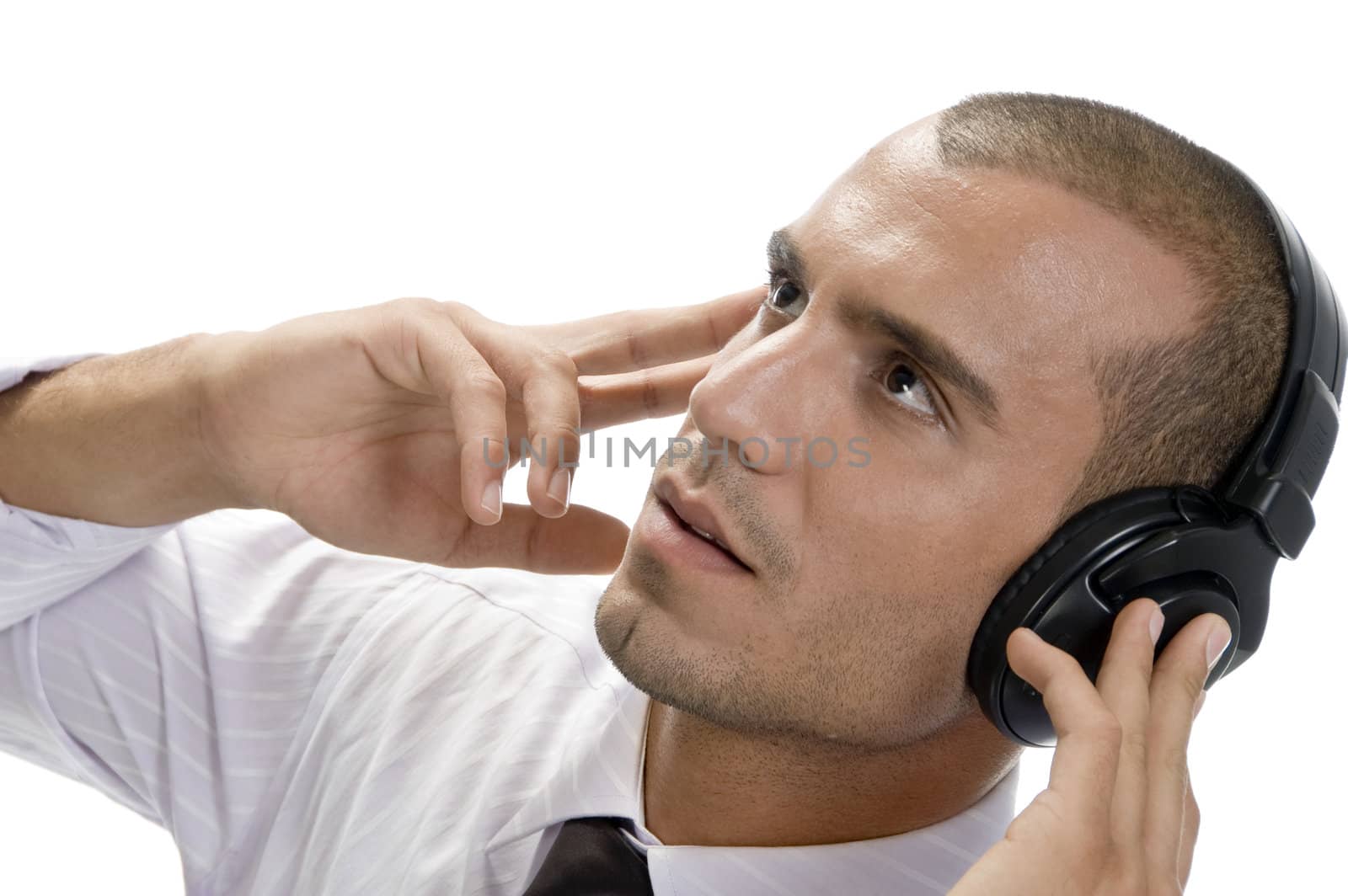 businessman holding headphone on an isolated white background