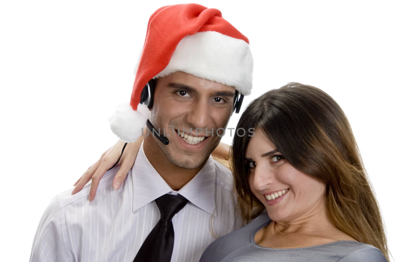 smiling young couple against white background