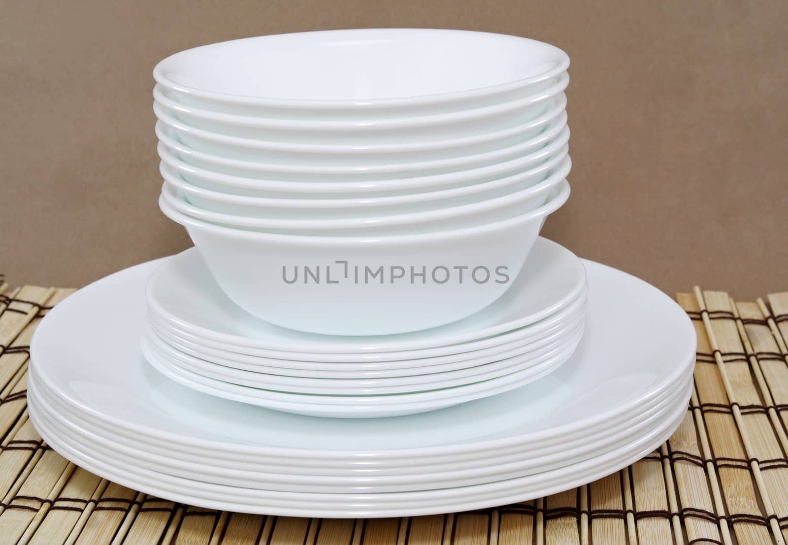 white bowls and plates stacked