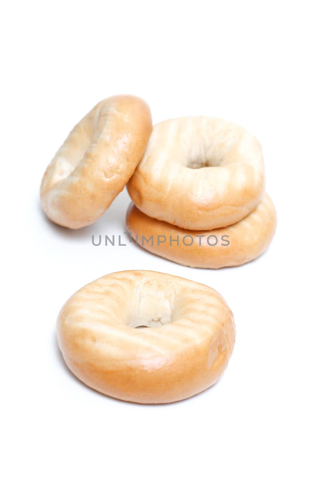Several bagels isolated on white