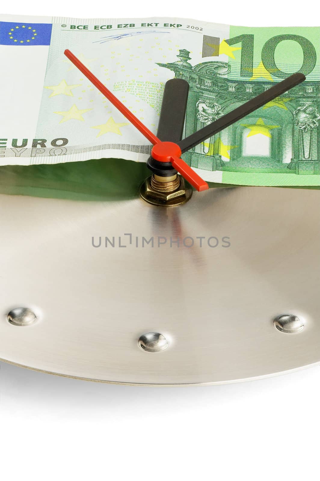 euro bill on a metal wall clock on white background