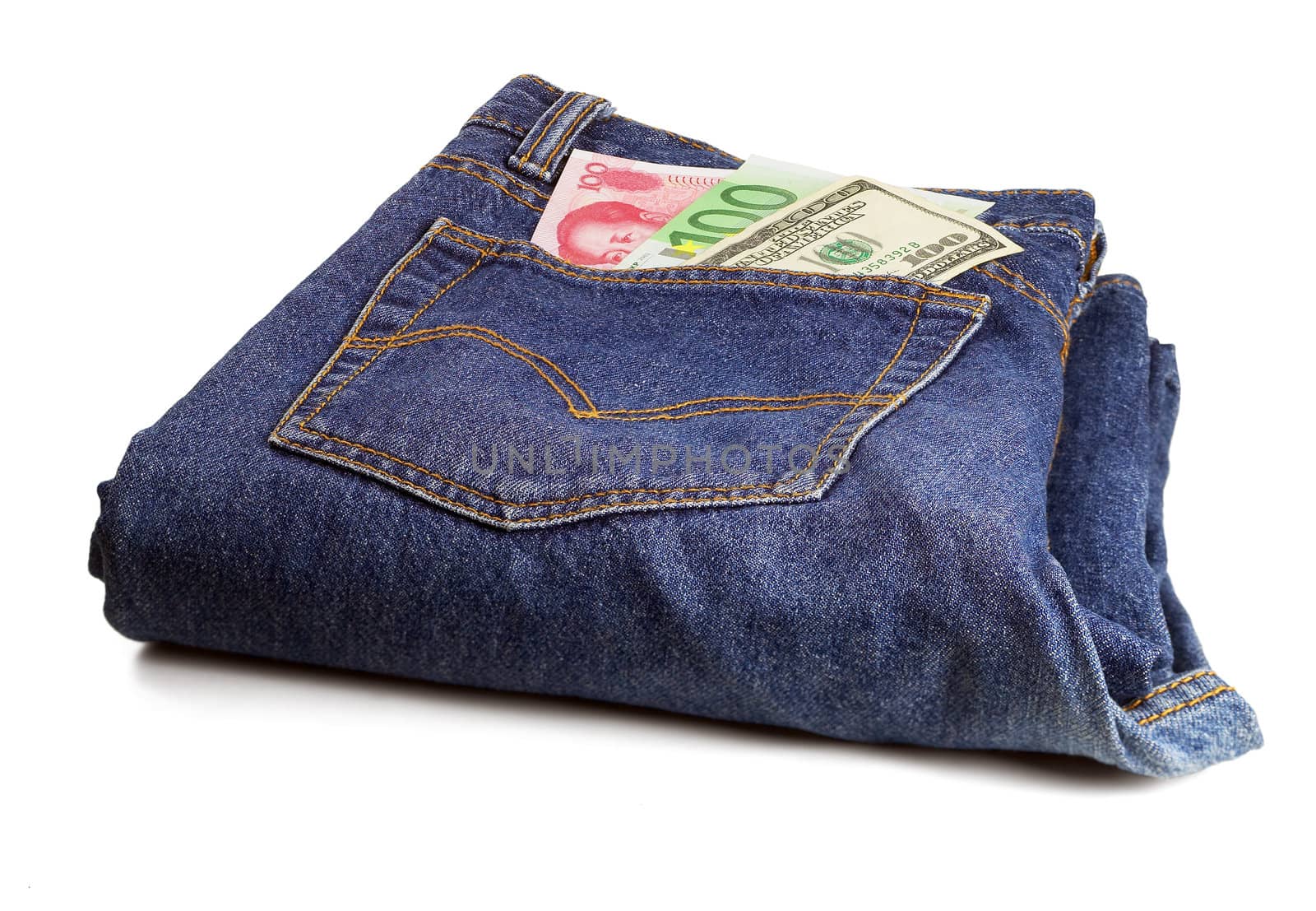 money bills on pocket of a pair of blue jeans