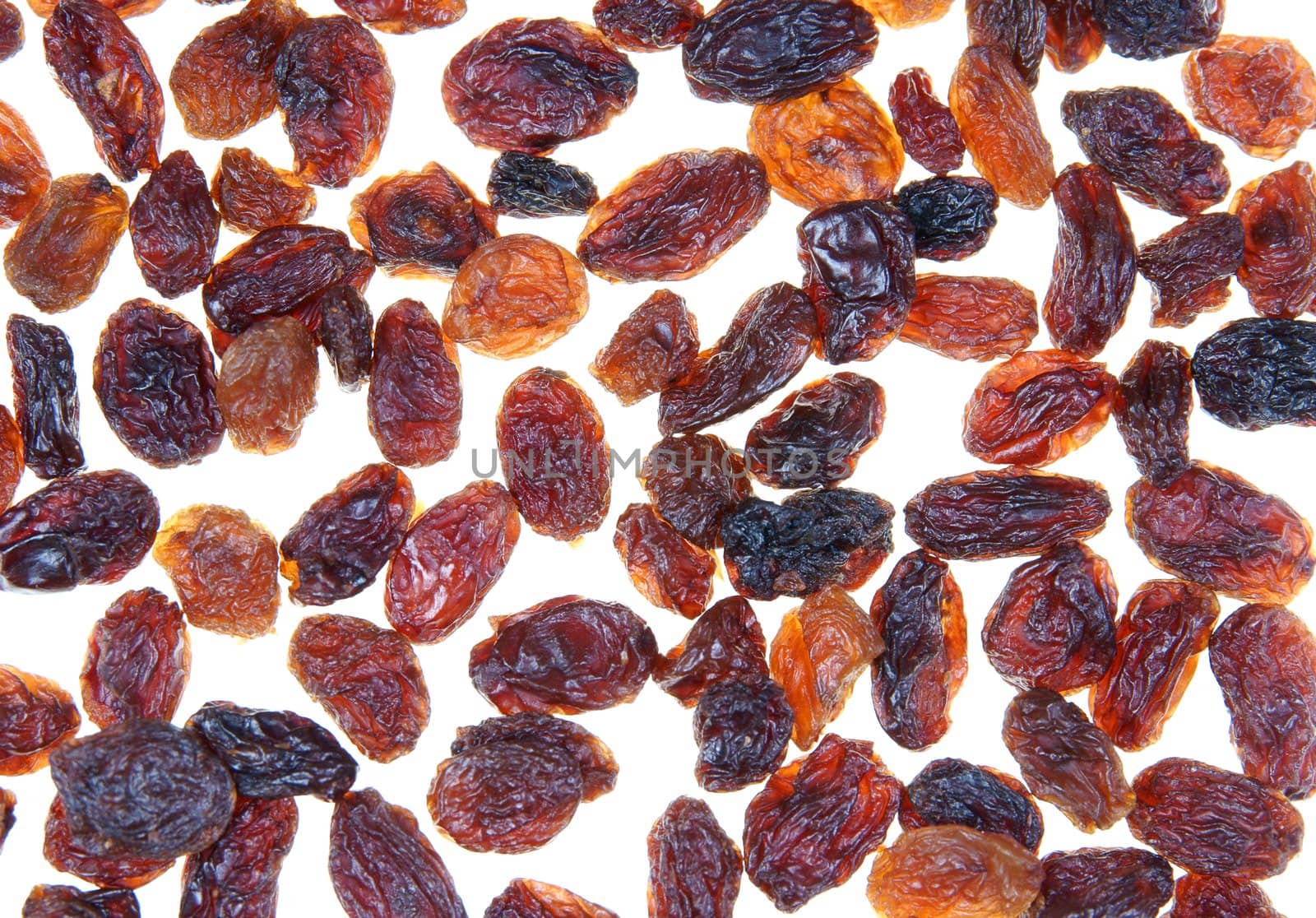 Closeup of raisins.Light on white background