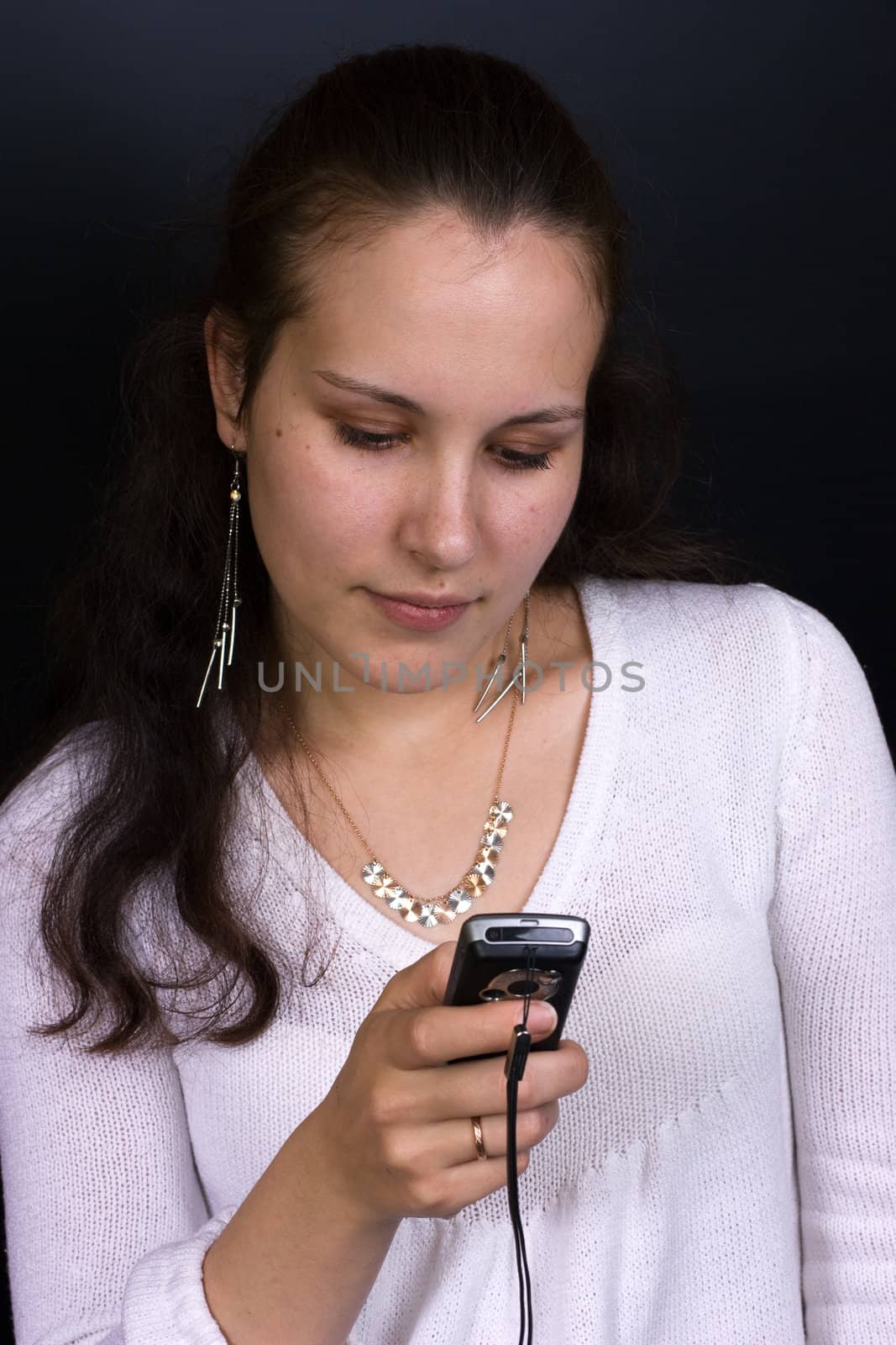 female looking in mobile phone