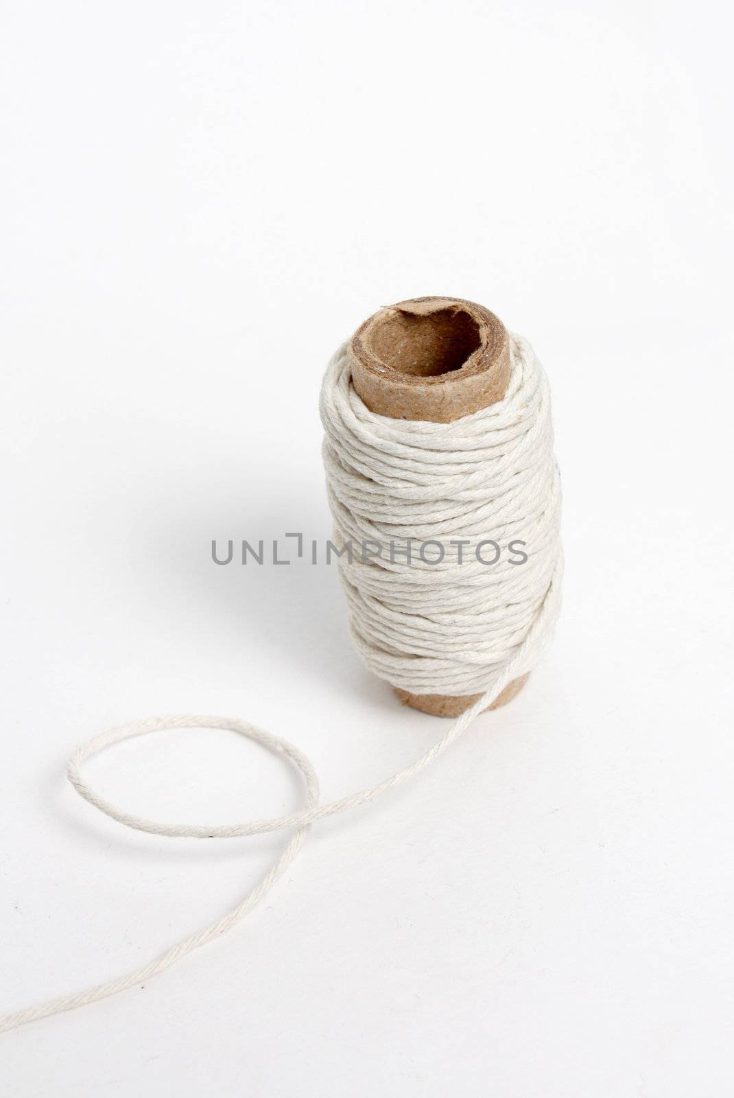 A white thread isolated on white