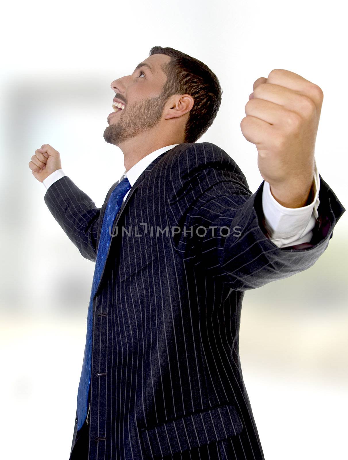 potrait of happy businessman
on an abstract  background
