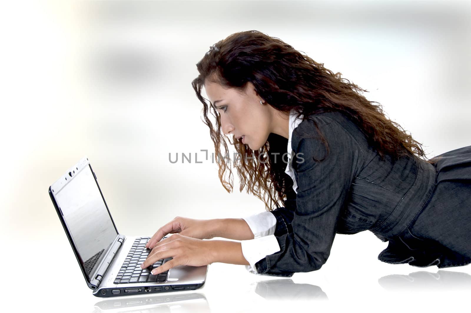 beautiful female working on laptop on an abstract  background