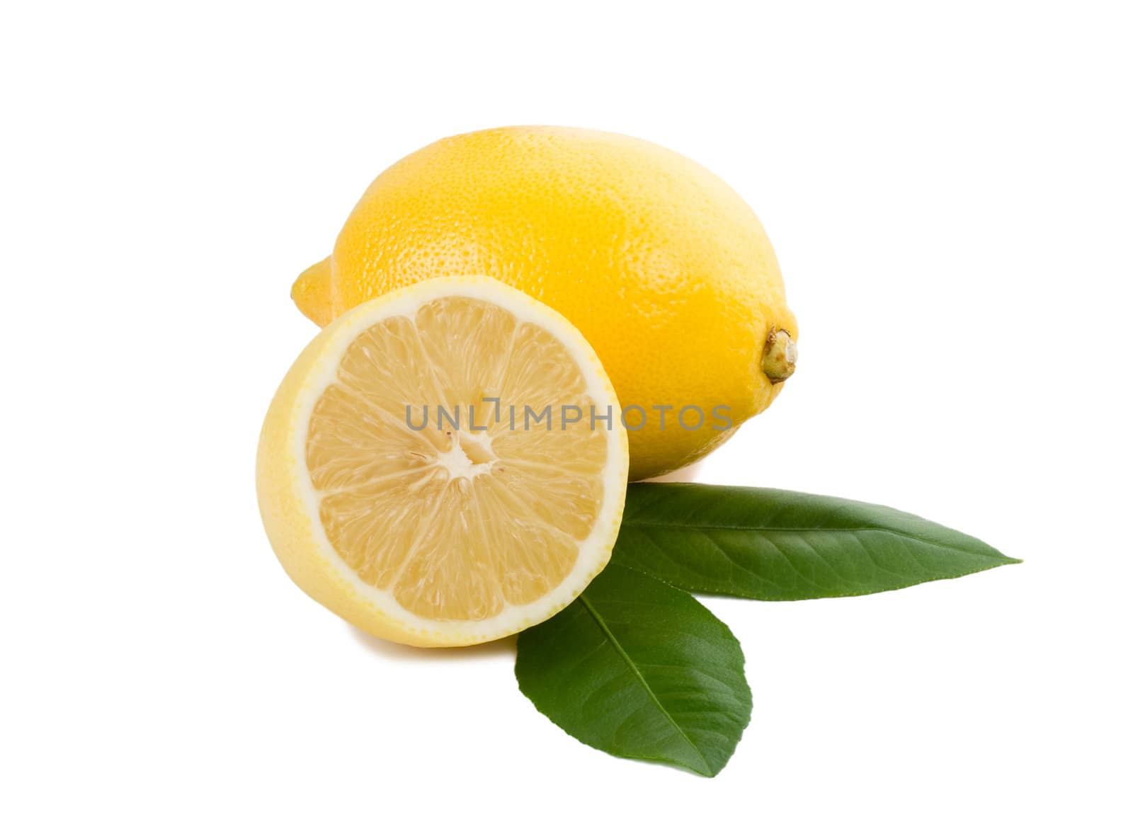 close-up lemon full and half with leaves, isolated on white