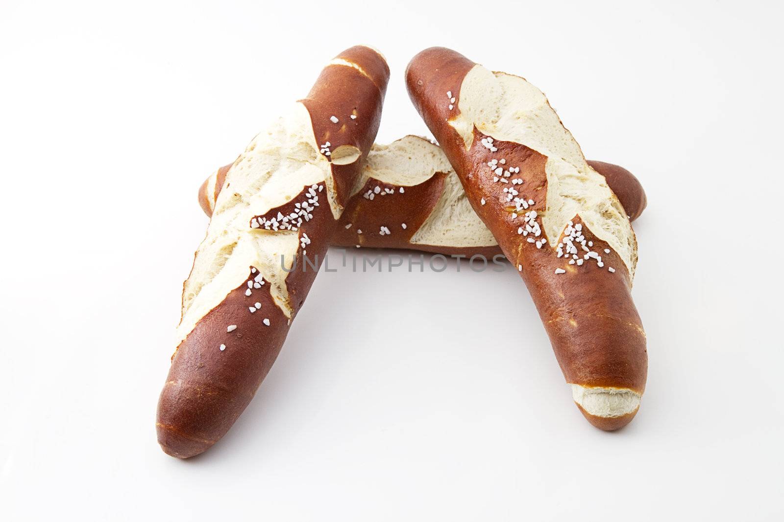 three items of some sort of pretzels on white background