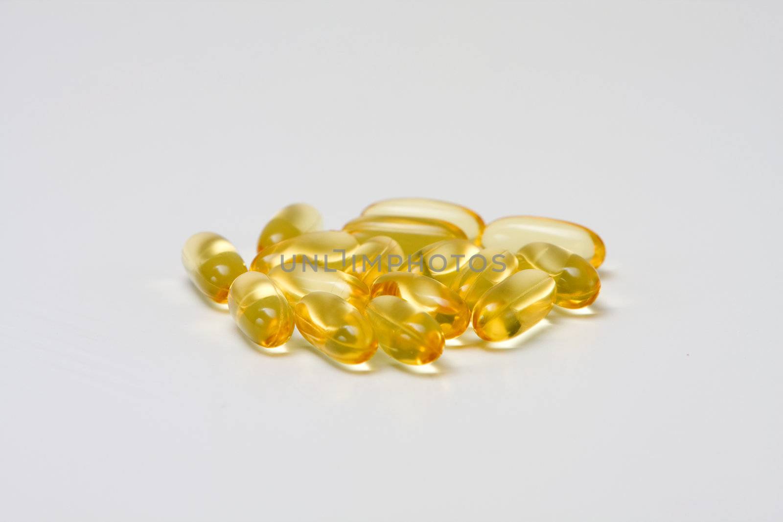 Yellow vitamin capsules with Omega 3 oil, isolated