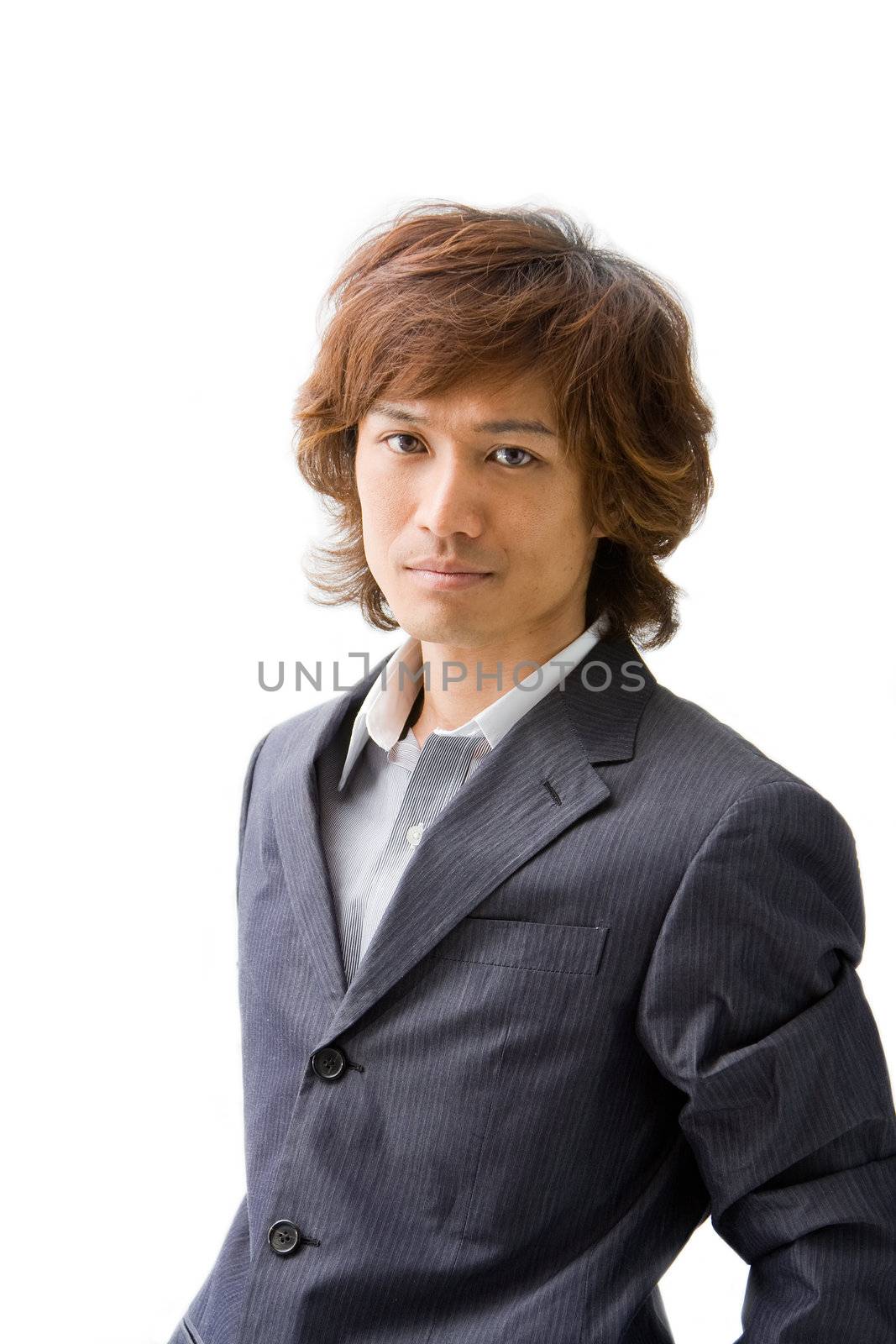 Relaxed Young Asian business man, isolated