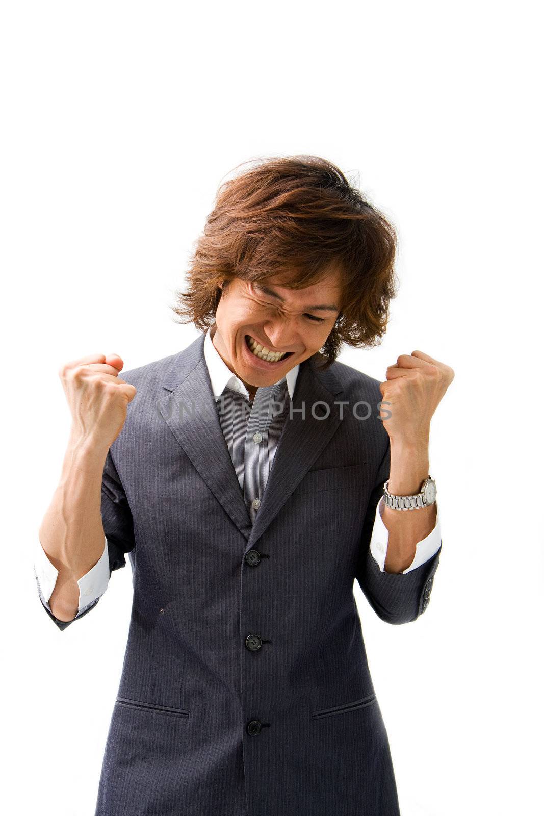 Young Asian business man celebrating a good deal, isolated