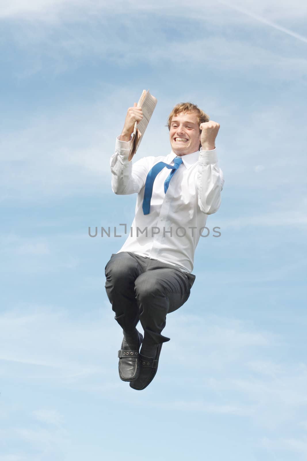 Business man jumping by leeser