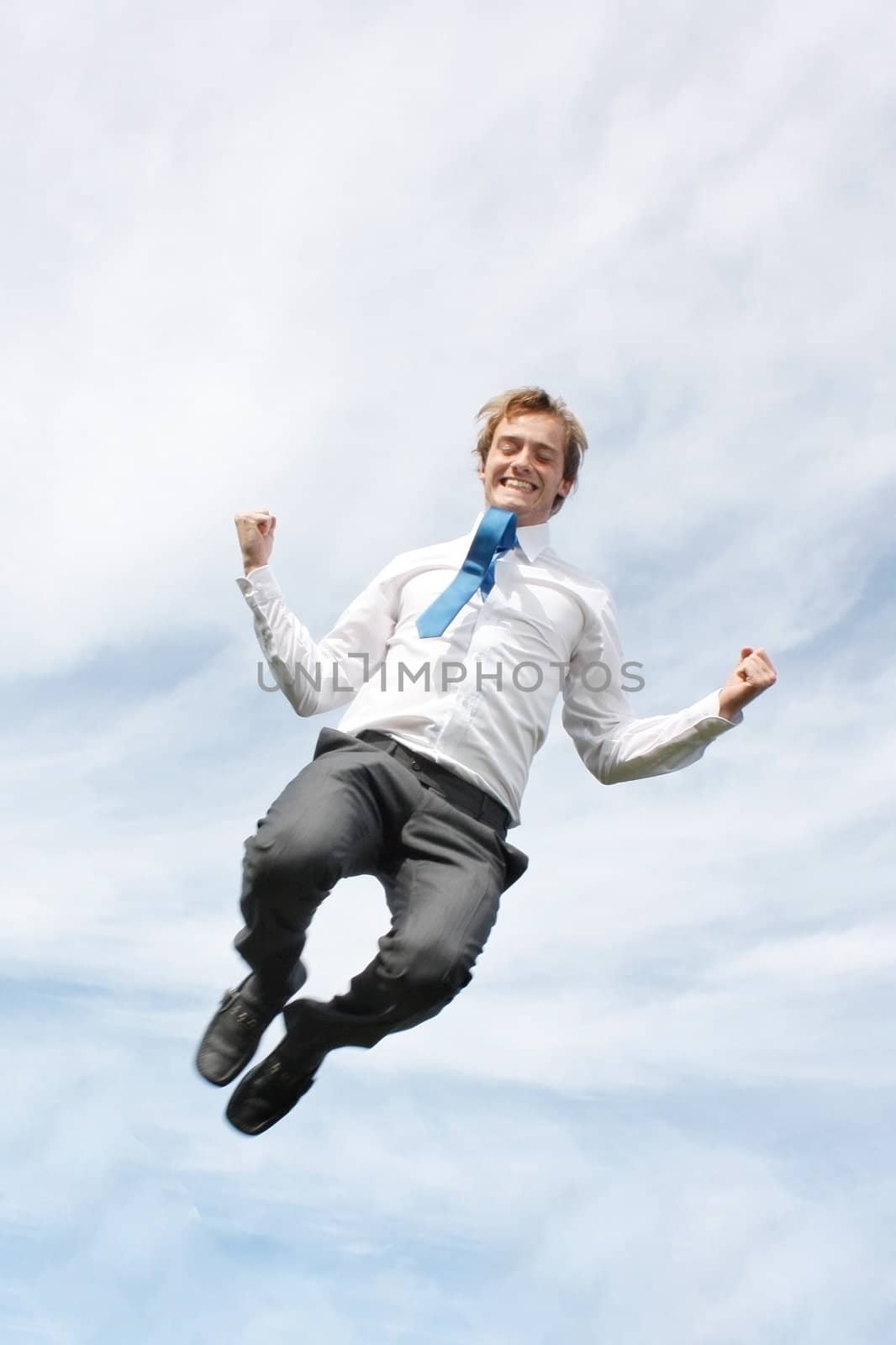 Business man jumping by leeser