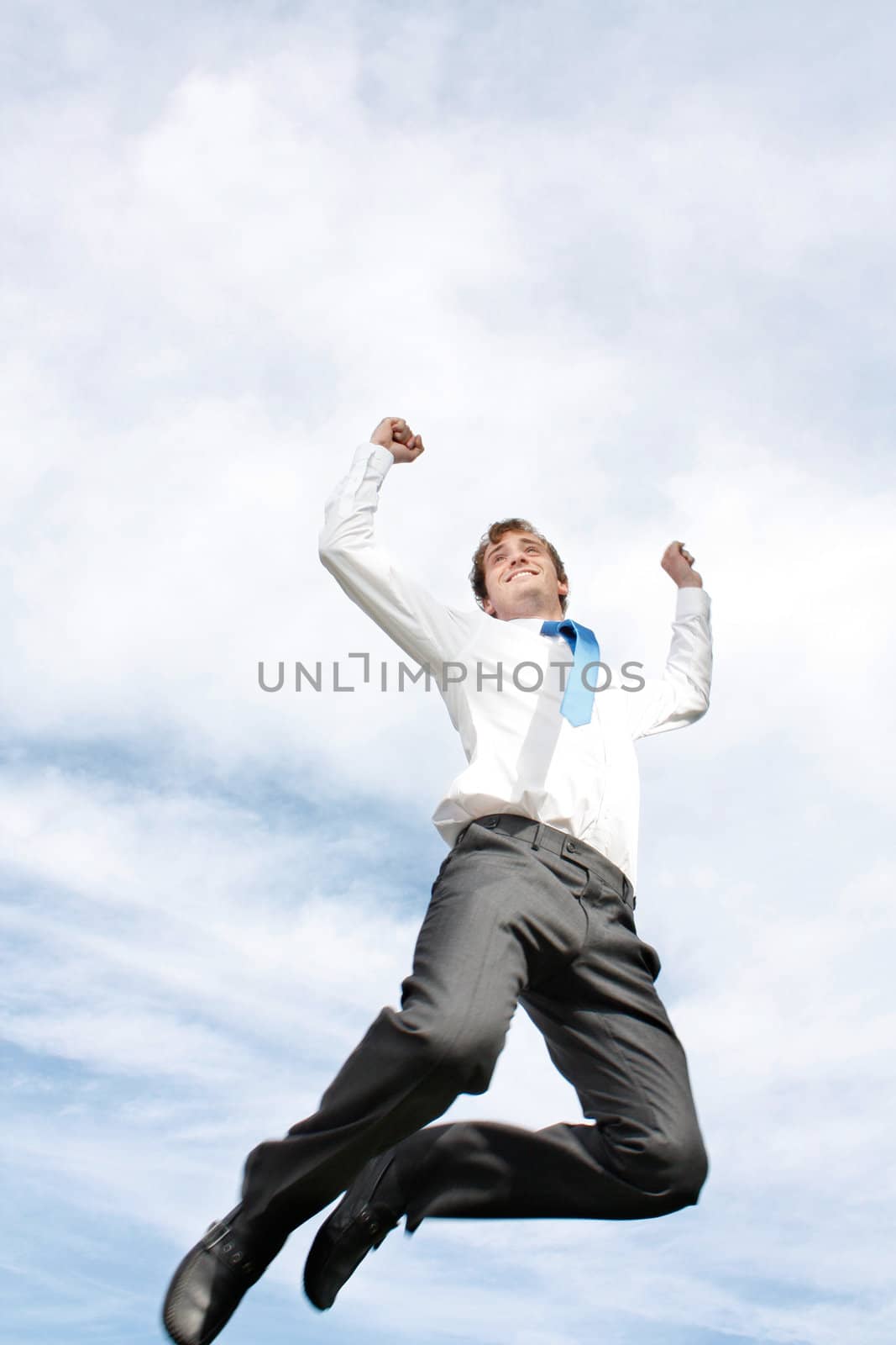 A very happy business man jumping