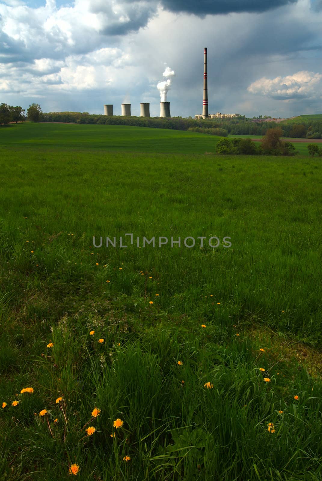 Landscape with cooling towers of power station.