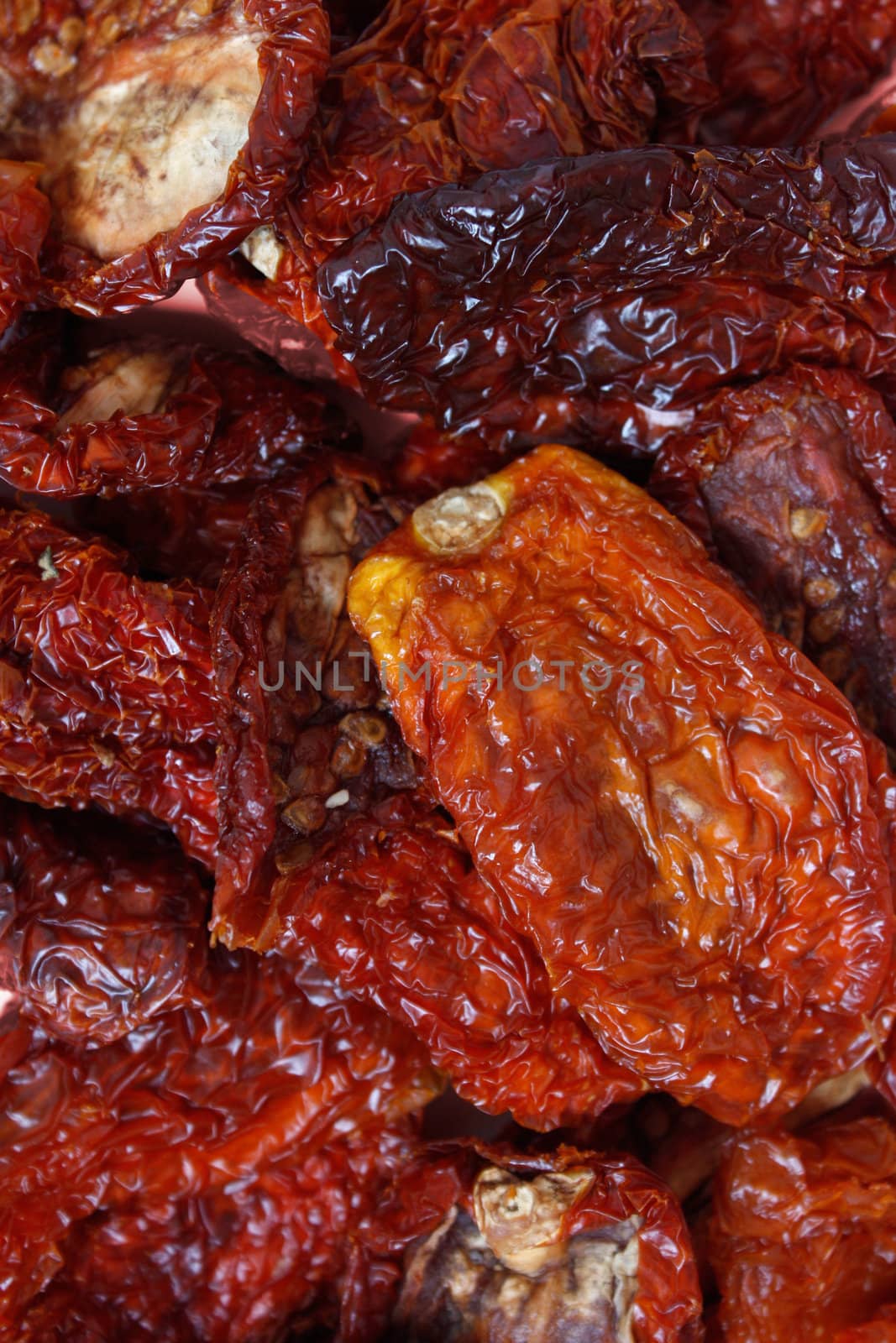 Dried tomatoes isolated on white