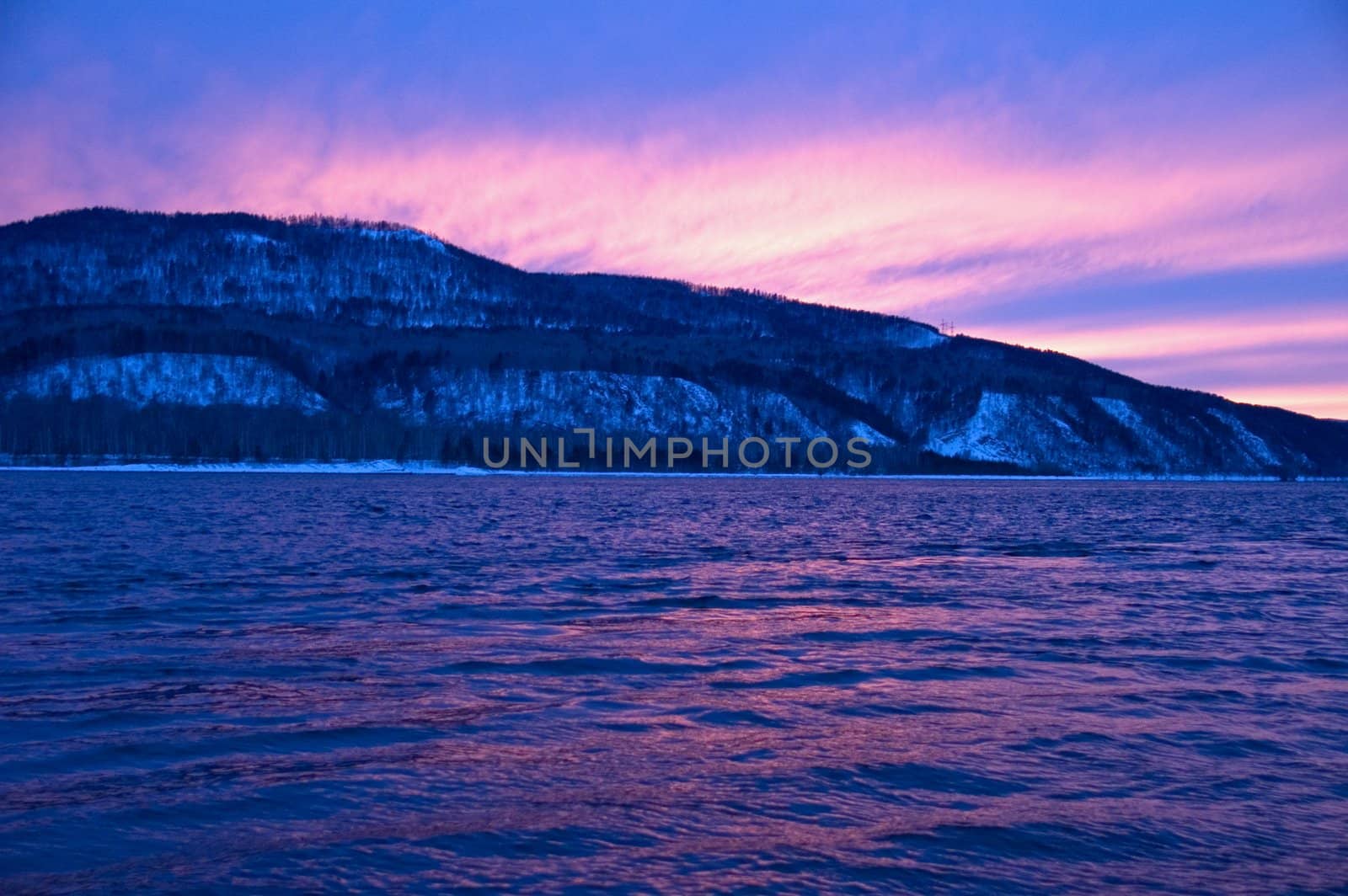 The river. A winter landscape. Ice, water. A river coast.