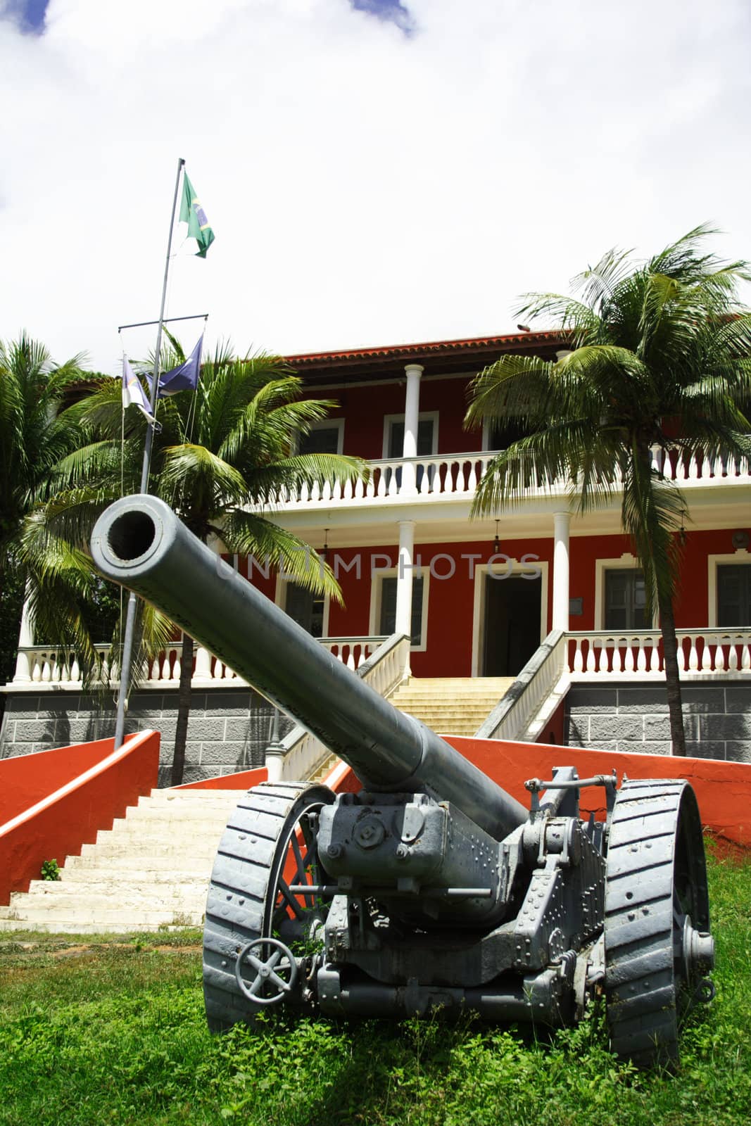 Fernando de Noronha's city hall. A red building with cannons.