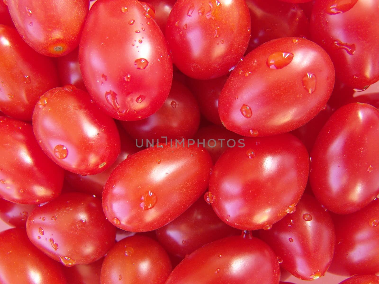 Background of ripe cherry tomatoes