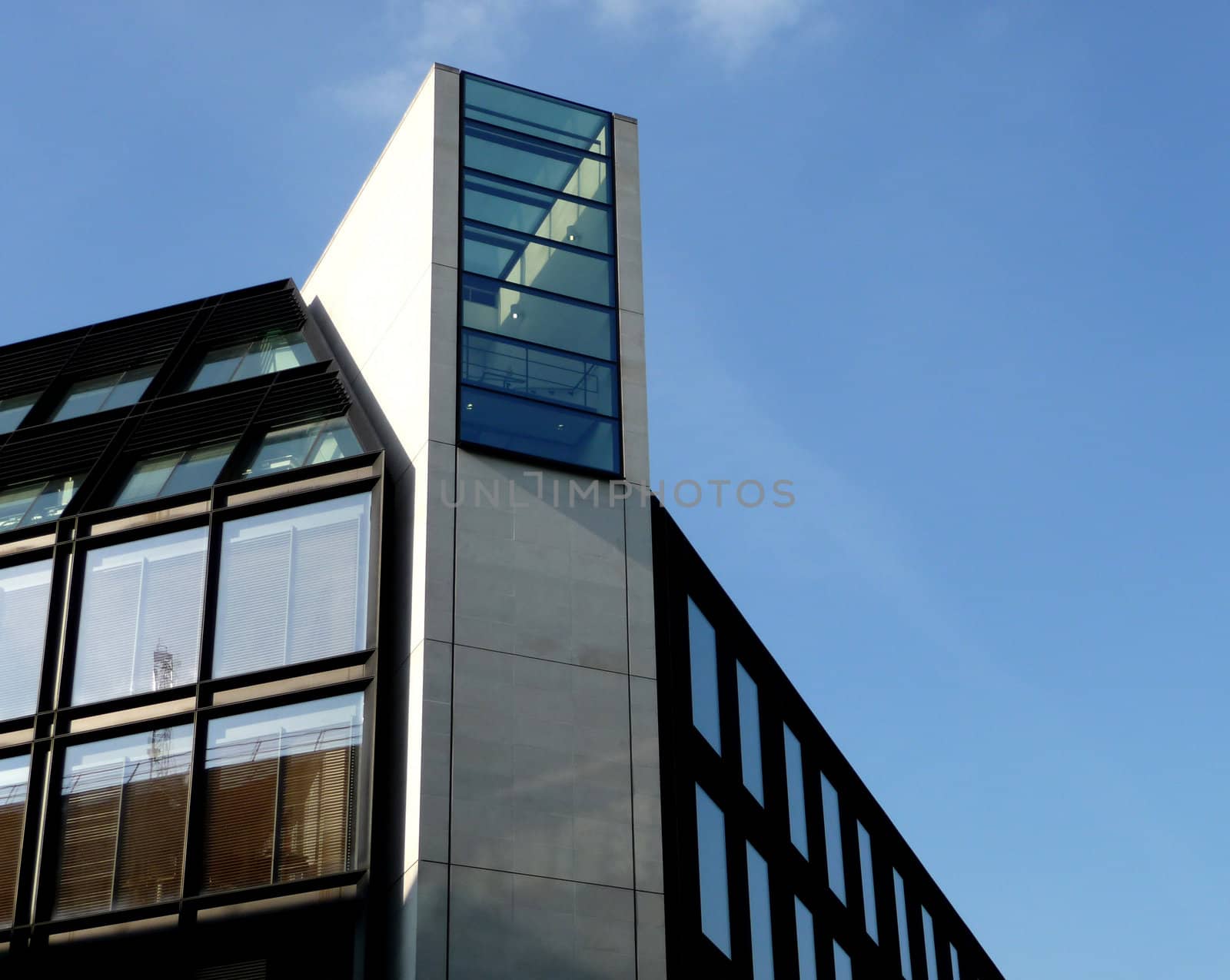 A photo of a modern styled office building.