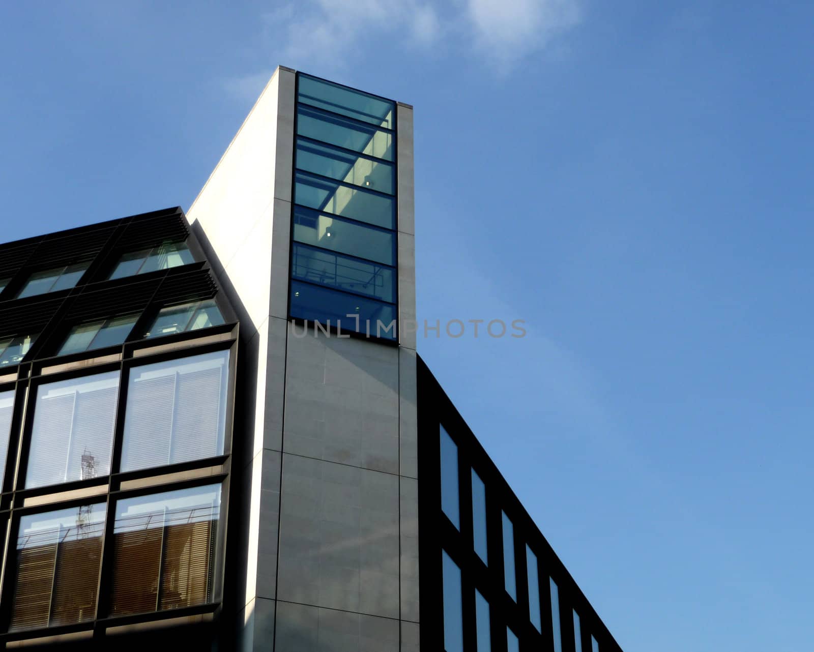 A photo of a modern styled office building.