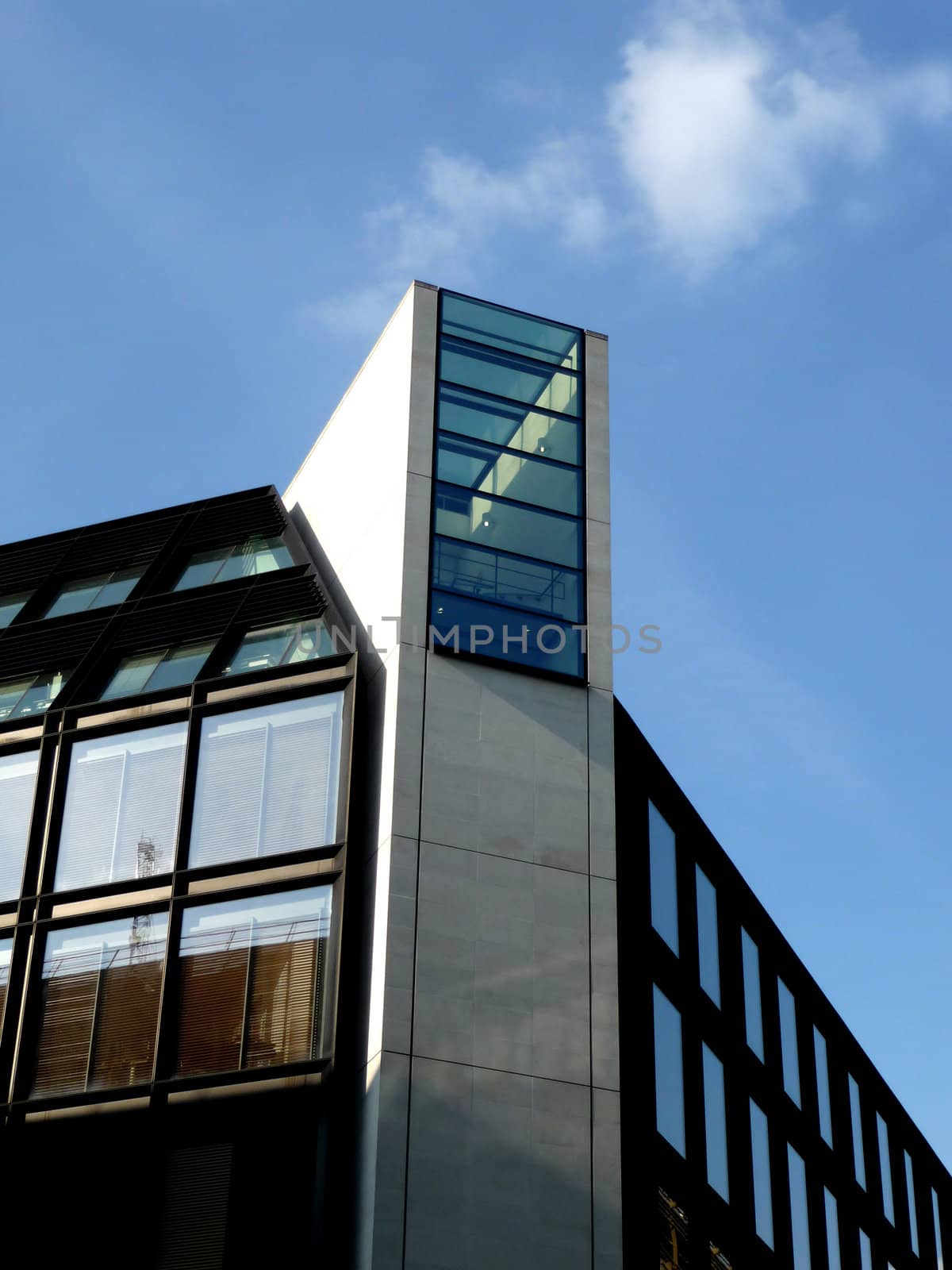 A photo of a modern styled office building.