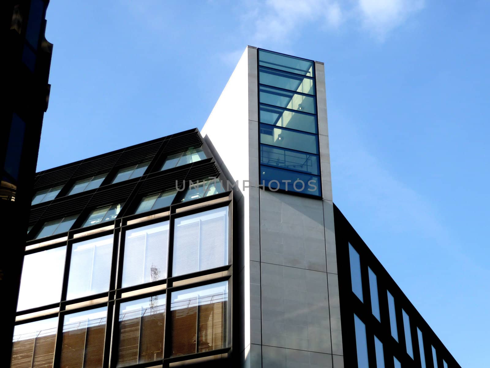 A photo of a modern styled office building.