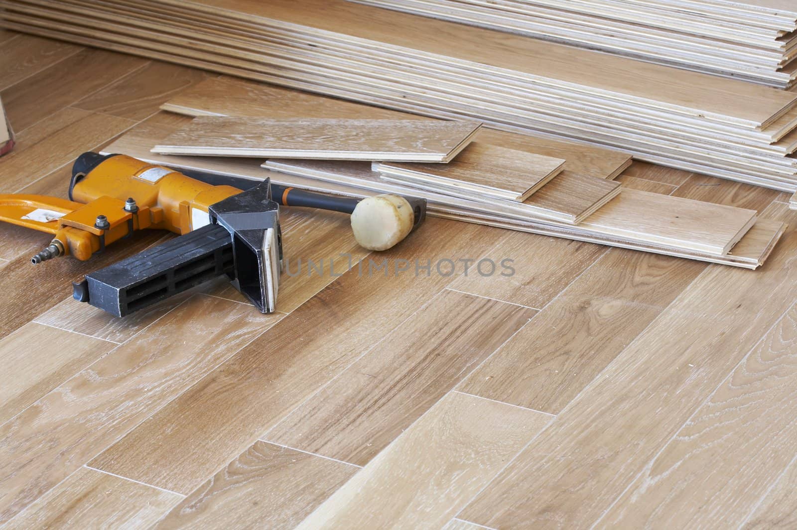 a picture of wood flooring and tools